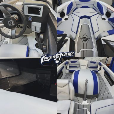 Luxury boat interior featuring a sleek design with gray and blue accents.