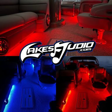 Interior of a boat with red and blue ambient lighting and branding for Cakes Audio.