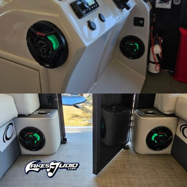 Close-up of stereo speakers and storage compartments in a boat's interior.
